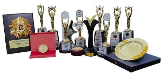 Auraliss Health dental awards and trophies showcasing clinical excellence